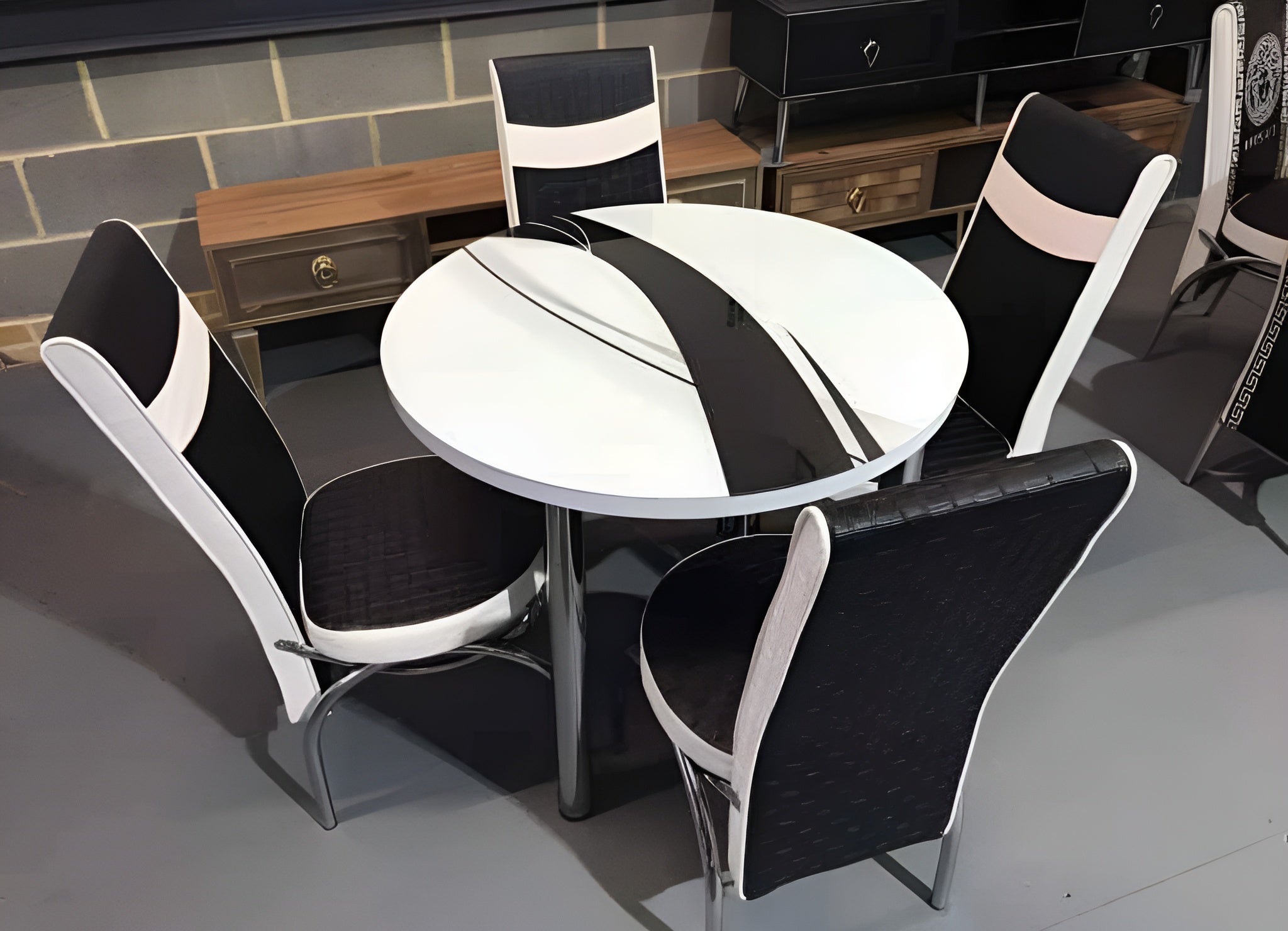 Round Glass And Steel Dining Table With 4 Faux Leather Chairs